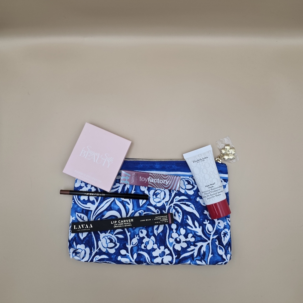 Estee Lauder Blue Floral Cosmetic Bag With Beauty Products - Picture 3 of 3